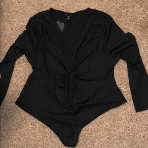 Plus size black bodysuit from Nasty Gal